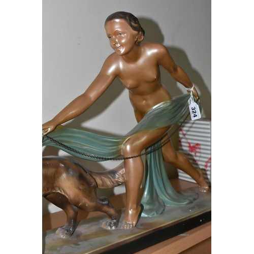 324 - A LARGE ART DECO PATINATED PLASTER SCULPTURE, a figure of a nude female and Alsatian dog, width 70cm... 