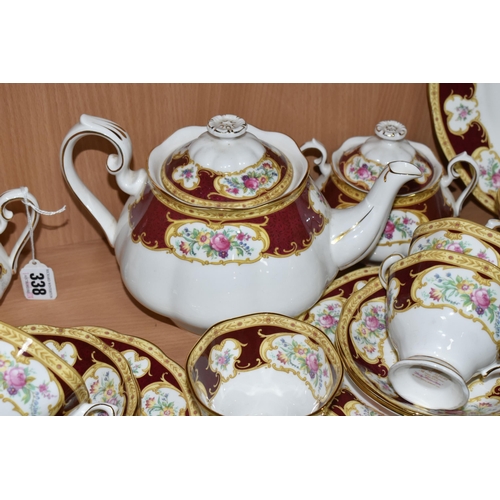 338 - A ROYAL ALBERT 'LADY HAMILTON' PATTERN TEA SET, comprising a cake plate, teapot, milk jug, covered s... 