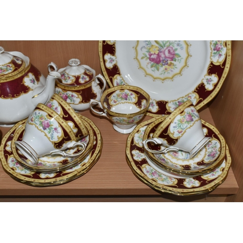 338 - A ROYAL ALBERT 'LADY HAMILTON' PATTERN TEA SET, comprising a cake plate, teapot, milk jug, covered s... 