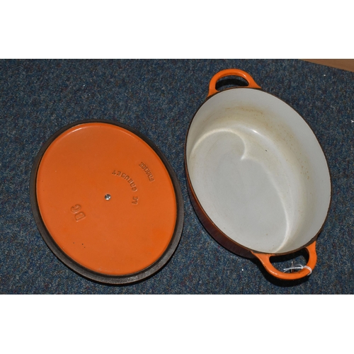 339 - AN OVAL LE CREUSET COVERED CASSEROLE DISH, Orange colourway (1) (Condition Report: no obvious damage... 