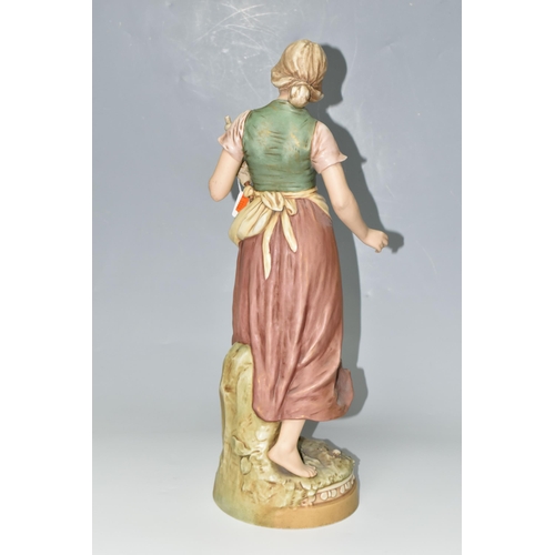 341 - A ROYAL DUX FIGURE, comprising a young woman gathering seaweed, with applied pink triangular Royal D... 