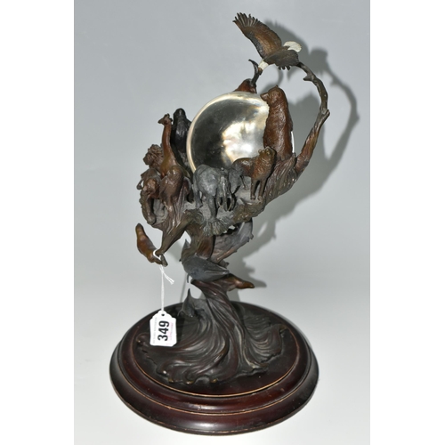 349 - A BRONZE FRANKLIN MINT SCULPTURE 'GUARDIANS OF THE WORLD' CRYSTAL BALL, by Steven Lord, a central cr... 