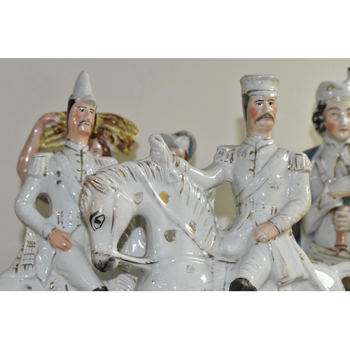 354 - FOUR STAFFORDSHIRE FLATBACKS, comprising two figures of military men on horseback, height 34cm, a fi... 