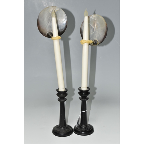 356 - A PAIR OF EBONY CANDLESTICKS WITH CARVED SHELL REFLECTORS, the ebony candlesticks with column like s... 