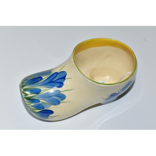 357 - A CLARICE CLIFF SMALL SABOT/CLOG, in Blue Crocus pattern, painted with the blue flowers on the toe a... 