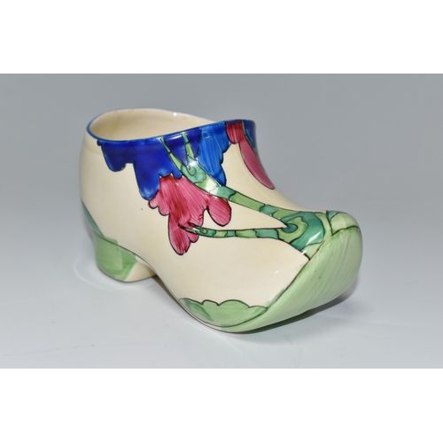 360 - A CLARICE CLIFF SMALL SABOT/CLOG, in Rudyard pattern, painted with green, pink and blue stylised tre... 