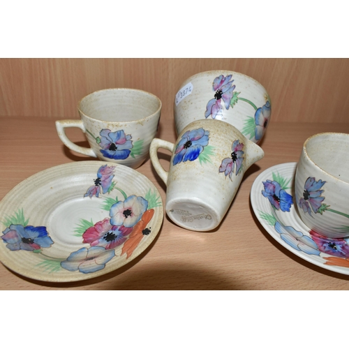 361 - A SIX PIECE CLARICE CLIFF 'ANEMONE' PART TEA SET, comprising two teacups and saucers, a cream jug an... 