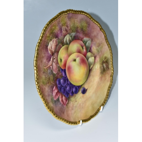 363 - A COALPORT HAND PAINTED CABINET PLATE, with gilt rim, hand painted with apples, grapes and hazel nut... 