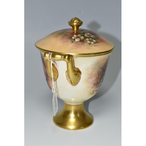 364 - A COALPORT COVERED VASE, the gilt footed vase with twin gilt handles, hand painted with apples, blac... 