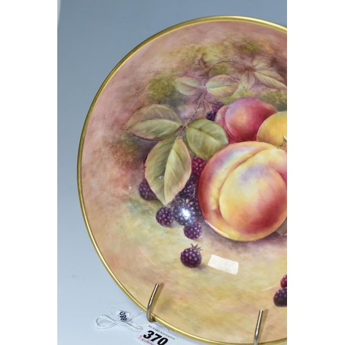 370 - A COALPORT FOOTED HAND PAINTED FRUIT BOWL, signed R Budd (Richard Budd), decorated with plums and bl... 