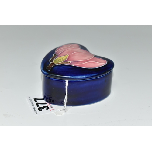 377 - A MOORCROFT POTTERY 'MAGNOLIA' PATTERN TRINKET BOX, heart shaped box and cover, tube lined with a pi... 