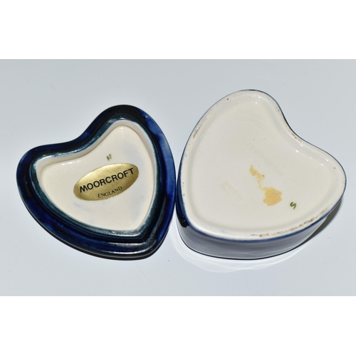 377 - A MOORCROFT POTTERY 'MAGNOLIA' PATTERN TRINKET BOX, heart shaped box and cover, tube lined with a pi... 