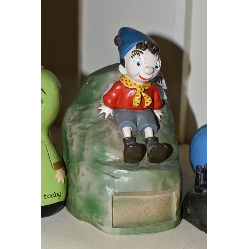 387 - A COLLECTION OF MONEY BOXES, including a vintage plastic Noddy Money box, a reproduction cast iron m... 