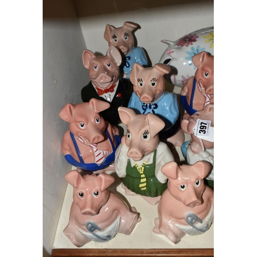 397 - NINE WADE NATWEST PIG MONEY BOXES AND EIGHT OTHER CERAMIC PIGGY BANKS, the NatWest comprising two Wo... 