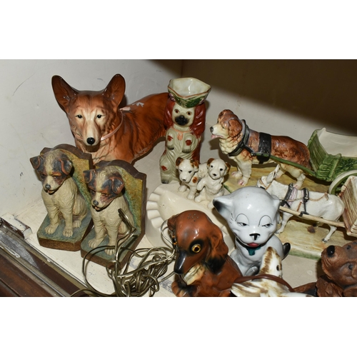 399 - A COLLECTION OF DOG THEMED LAMPS, BOOKENDS AND ORNMENTS, ETC, including two pottery dog shaped lamps... 