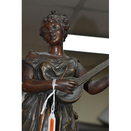 403 - THREE FRENCH BRONZED SPELTER FIGURES, supported by circular wooden bases, comprising 'Jeuness', heig... 