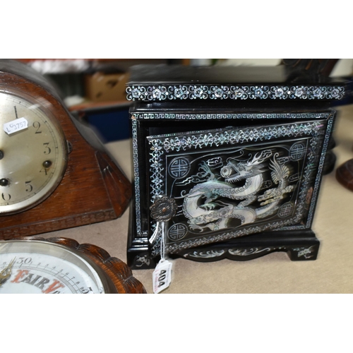 404 - A GROUP OF CLOCKS AND AN ORIENTAL STYLE JEWELLERY BOX, black lacquered with three drawers and mother... 