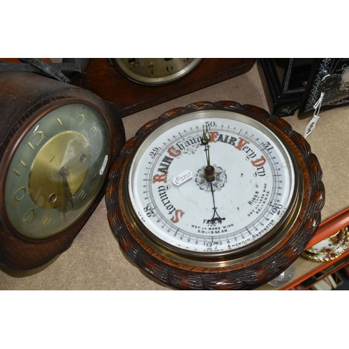 404 - A GROUP OF CLOCKS AND AN ORIENTAL STYLE JEWELLERY BOX, black lacquered with three drawers and mother... 