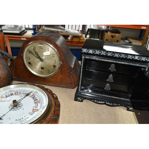 404 - A GROUP OF CLOCKS AND AN ORIENTAL STYLE JEWELLERY BOX, black lacquered with three drawers and mother... 