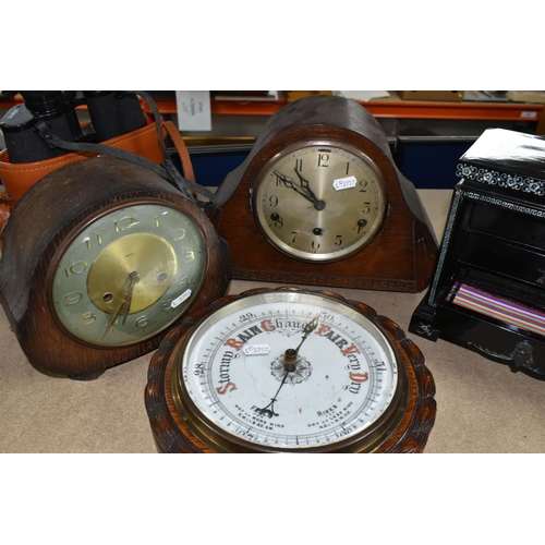 404 - A GROUP OF CLOCKS AND AN ORIENTAL STYLE JEWELLERY BOX, black lacquered with three drawers and mother... 