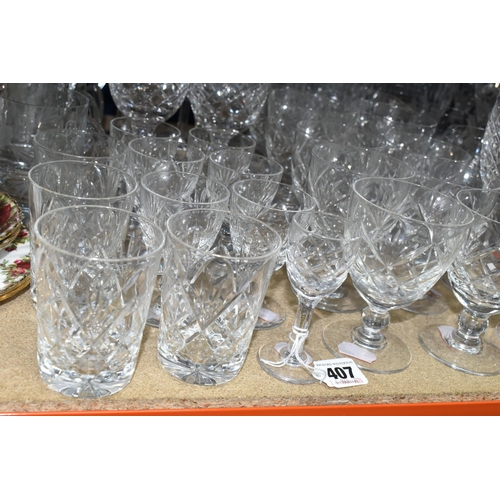 407 - A LARGE QUANTITY OF CUT CRYSTAL AND GLASSWARE, comprising a set of six Waterford 'Comeragh' pattern ... 