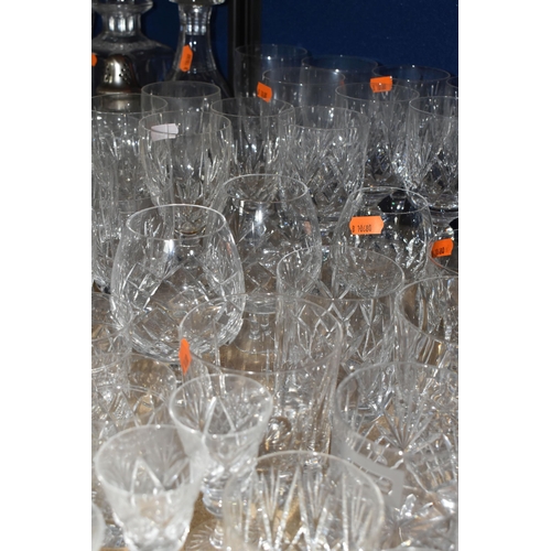 409 - A LARGE QUANTITY OF CUT CRYSTAL AND GLASSWARE, comprising wine glasses, ale glasses, whisky tumblers... 