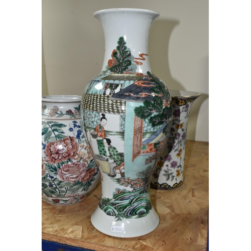 438 - A 19TH CENTURY CHINESE FAMILLE VERT BALUSTER VASE, enamelled with a continuous scene of figures in b... 