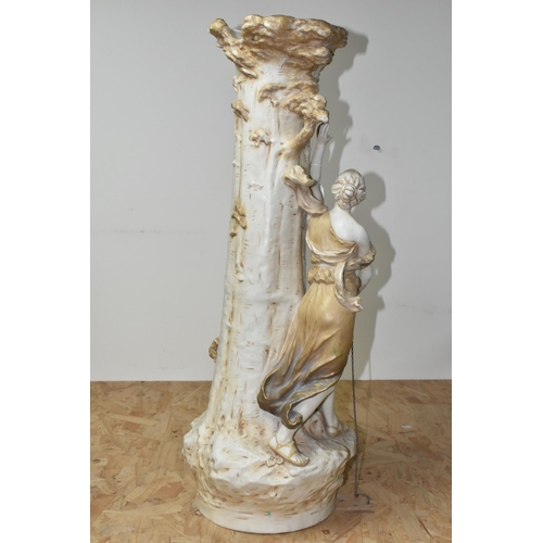 439 - AN EARLY 20TH CENTURY ROYAL DUX FIGURAL VASE, modelled as a tree trunk with classical female figure ... 