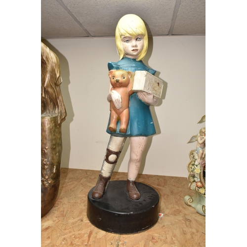 441 - A VINTAGE FIBREGLASS DISABILITY CHARITY COLLECTION BOX IN THE FORM OF A GIRL HOLDING A TEDDY WITH HE... 