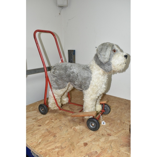 443 - A PEDIGEE PUSH-ALONG OR RIDE-ON DOG, c.1960's, complete and in fairly good condition with only minor... 