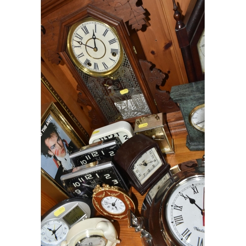 450 - A COLLECTION OF LATE 19TH CENTURY AND MODERN CLOCKS AND A BAROMETER, including an American Jerome & ... 