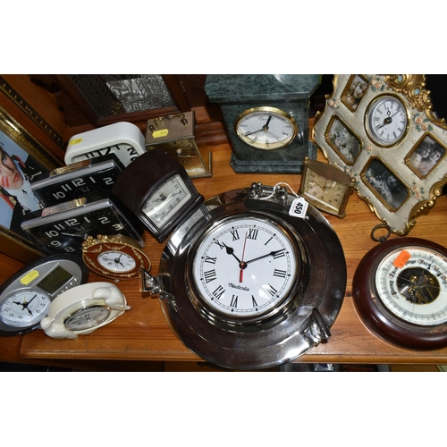 450 - A COLLECTION OF LATE 19TH CENTURY AND MODERN CLOCKS AND A BAROMETER, including an American Jerome & ... 