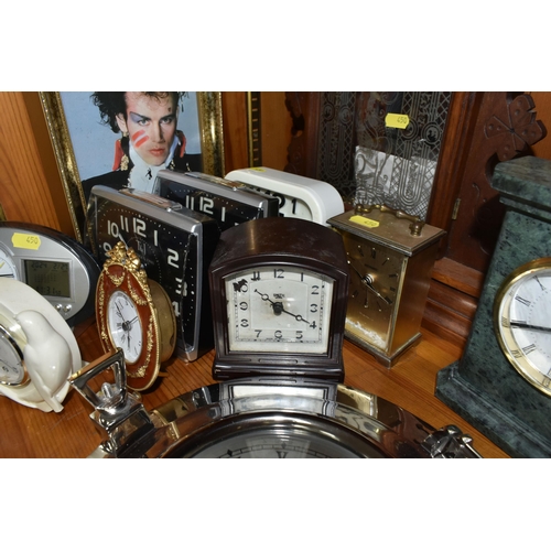 450 - A COLLECTION OF LATE 19TH CENTURY AND MODERN CLOCKS AND A BAROMETER, including an American Jerome & ... 