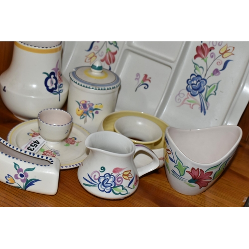 453 - EIGHT PIECES OF POOLE POTTERY, all with floral decoration, including an hors oeuvres dish, an eggcup... 