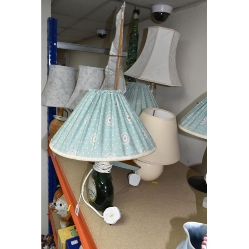 466 - A SMALL MID- CENTURY POND YACHT AND A COLLECTION OF TABLE LAMPS, comprising hand painted wooden yach... 