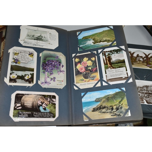 480 - TWO ALBUMS OF POSTCARDS containing approximately 564 early 20th century cards (with exceptions) and ... 