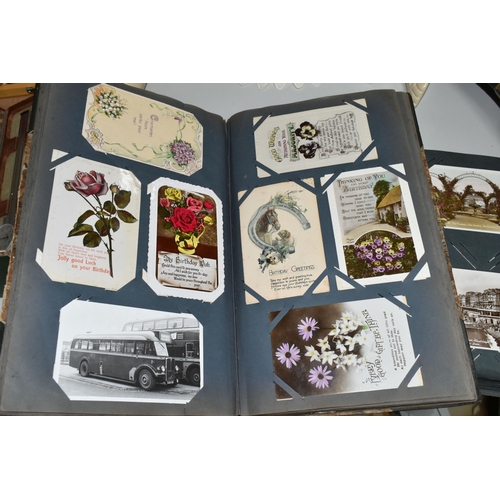 480 - TWO ALBUMS OF POSTCARDS containing approximately 564 early 20th century cards (with exceptions) and ... 