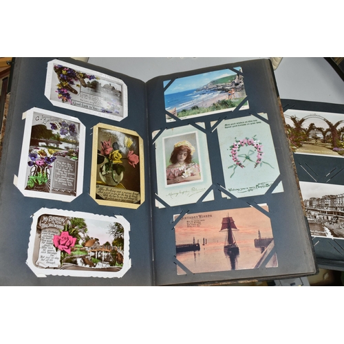 480 - TWO ALBUMS OF POSTCARDS containing approximately 564 early 20th century cards (with exceptions) and ... 