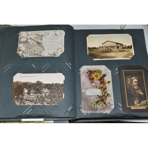 480 - TWO ALBUMS OF POSTCARDS containing approximately 564 early 20th century cards (with exceptions) and ... 