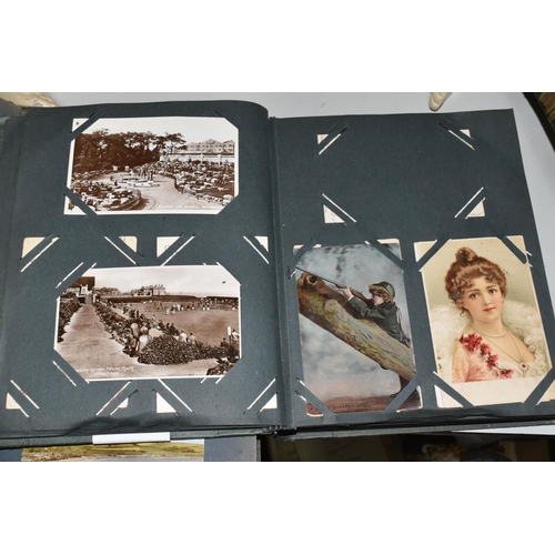 480 - TWO ALBUMS OF POSTCARDS containing approximately 564 early 20th century cards (with exceptions) and ... 