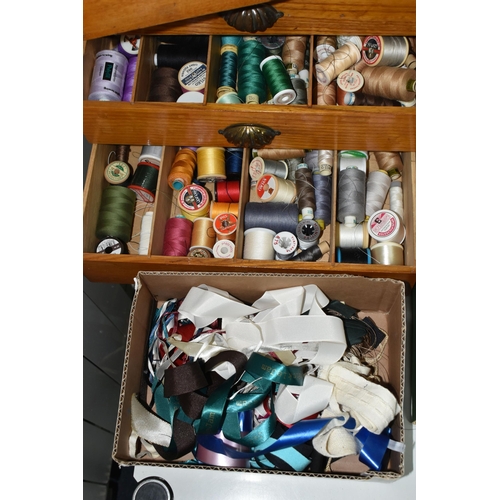 482 - A QUANTITY OF ASSORTED SEWING THREAD AND COTTON ETC., all contained in a pair of three drawer wooden... 