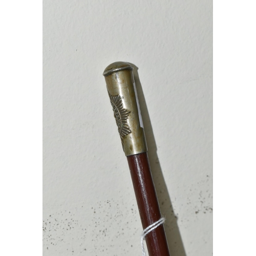 483 - A MILITARY SWAGGER STICK WITH WORCESTERSHIRE REGIMENT METAL MOUNT, approximate length 70cm