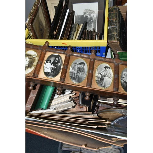 490 - THREE BOXES OF EARLY 20TH CENTURY EPHEMERA containing eight albums of postcards and personal photogr... 