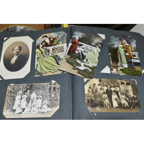 490 - THREE BOXES OF EARLY 20TH CENTURY EPHEMERA containing eight albums of postcards and personal photogr... 