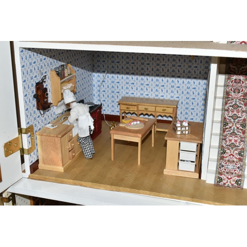 510 - A MODERN FOUR STOREY DOLLS HOUSE OF GEORGIAN STYLE WITH A QUANTITY OF ACCESSORIES, the top three sto... 