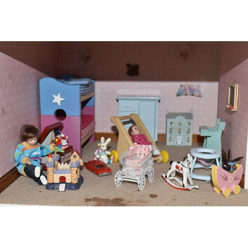 510 - A MODERN FOUR STOREY DOLLS HOUSE OF GEORGIAN STYLE WITH A QUANTITY OF ACCESSORIES, the top three sto... 