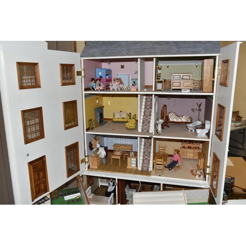 510 - A MODERN FOUR STOREY DOLLS HOUSE OF GEORGIAN STYLE WITH A QUANTITY OF ACCESSORIES, the top three sto... 