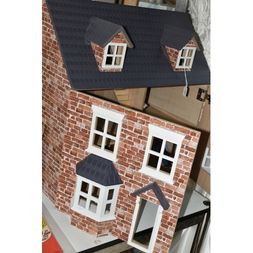 513 - A MODERN THREE STOREY DOLLS HOUSE OF LATE VICTORIAN STYLE, with papered red brick effect exterior, h... 