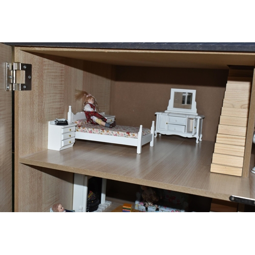 513 - A MODERN THREE STOREY DOLLS HOUSE OF LATE VICTORIAN STYLE, with papered red brick effect exterior, h... 