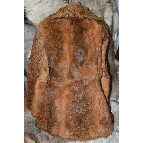 515 - FIVE REINDEER HIDES AND TWO FUR JACKETS, the reindeer hides of similar size, length of longest 145cm... 